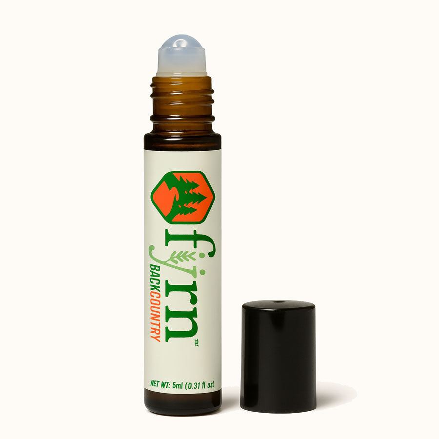Roll-on bottle with a white label featuring green text and a logo on a white background