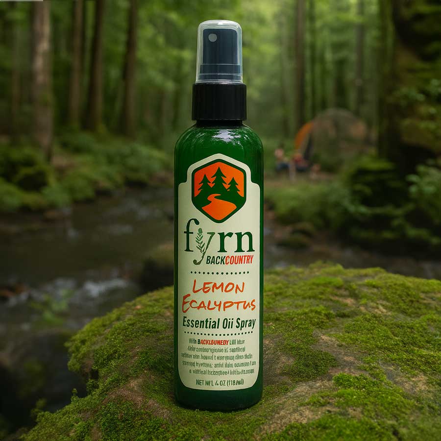 Fyrn Backcountry Lemon Eucalyptus essential oil spray bottle waiting to be used by a hiker.