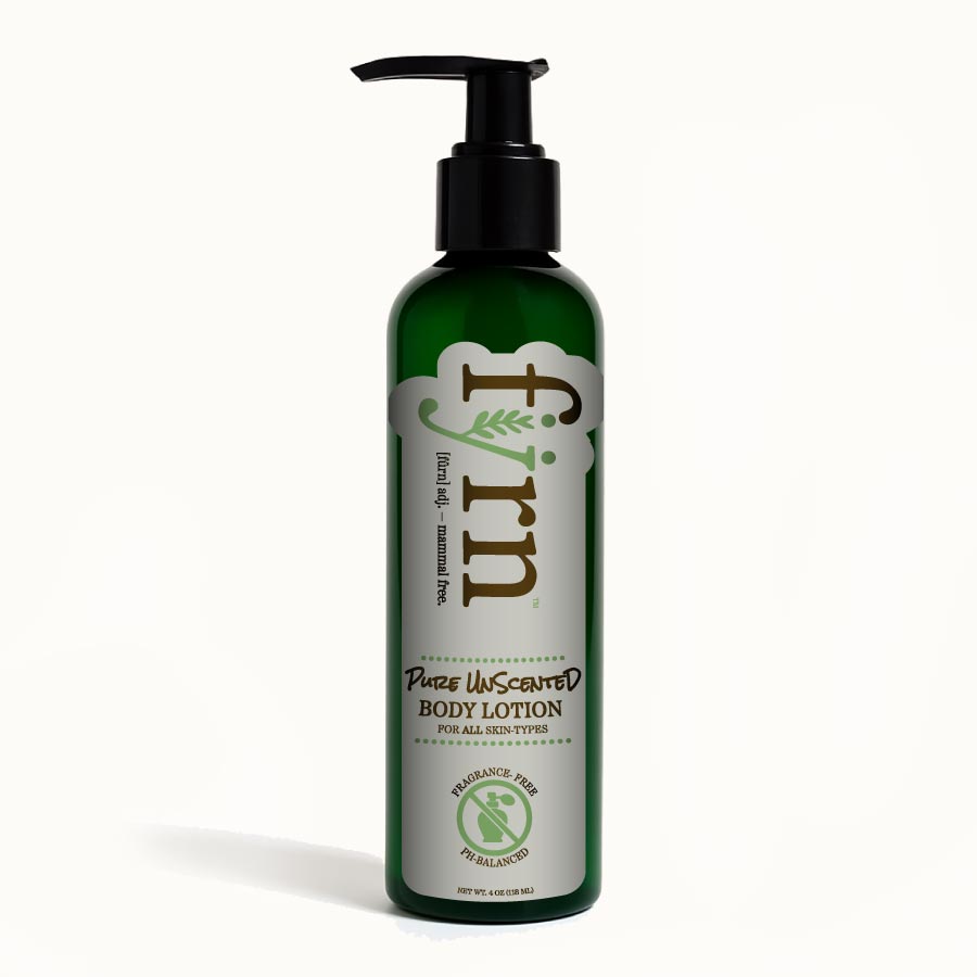 Green bottle of body lotion with black pump on a white background