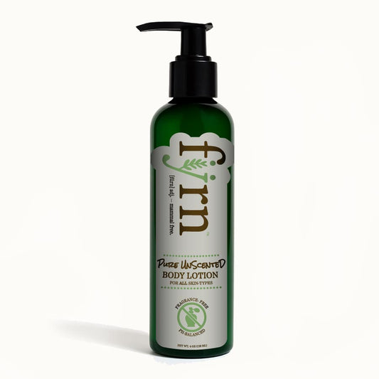 Green bottle of body lotion with black pump on a white background