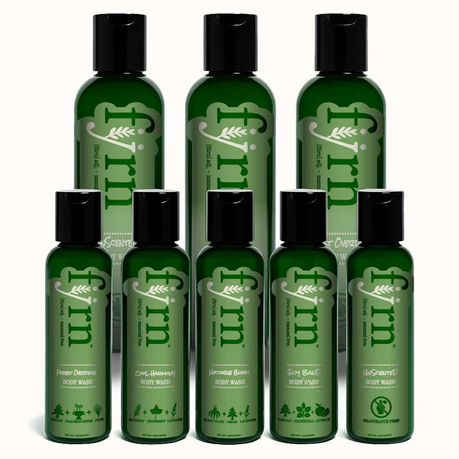 Set of green bottles with black caps labeled 'furn' on a white background