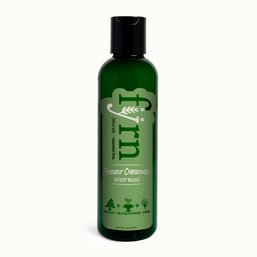 Green bottle of body wash with branding on a white background