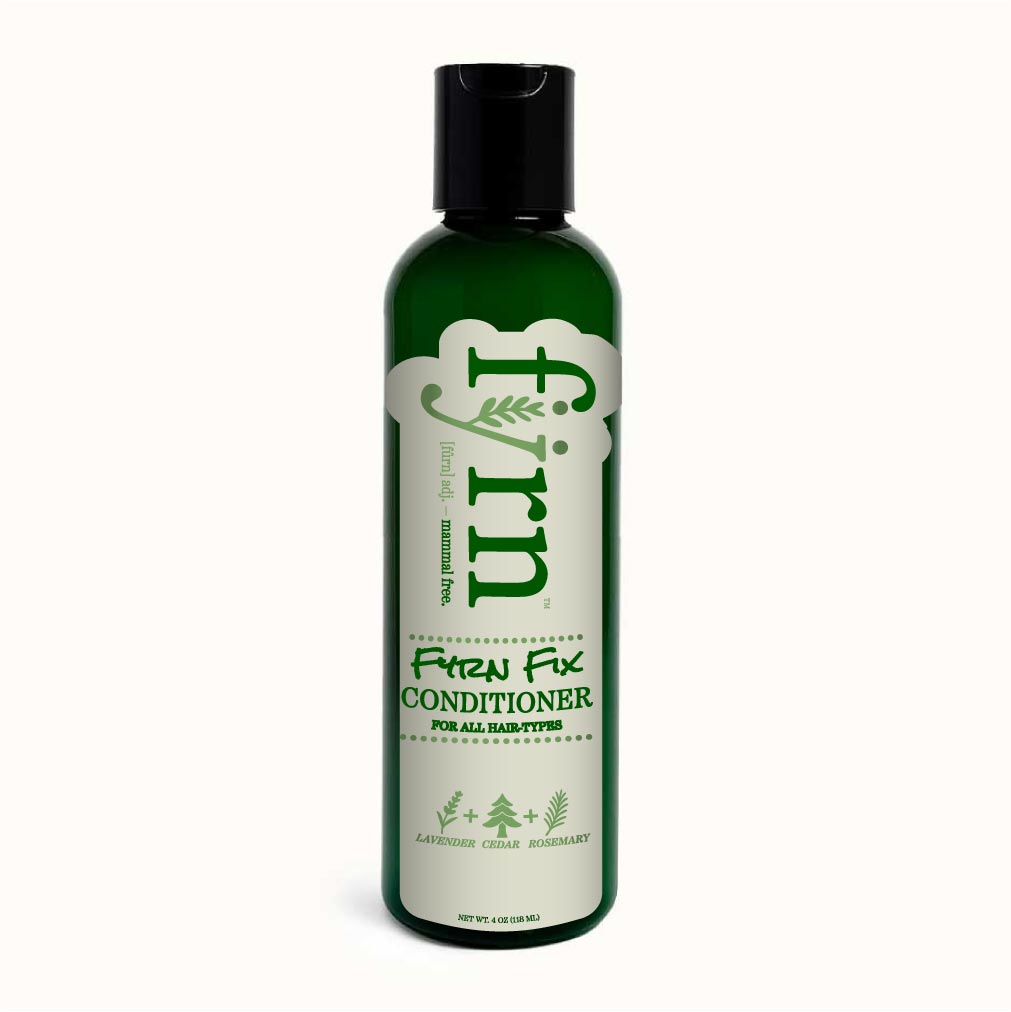Green bottle of Fyrn Fix Conditioner on a white background