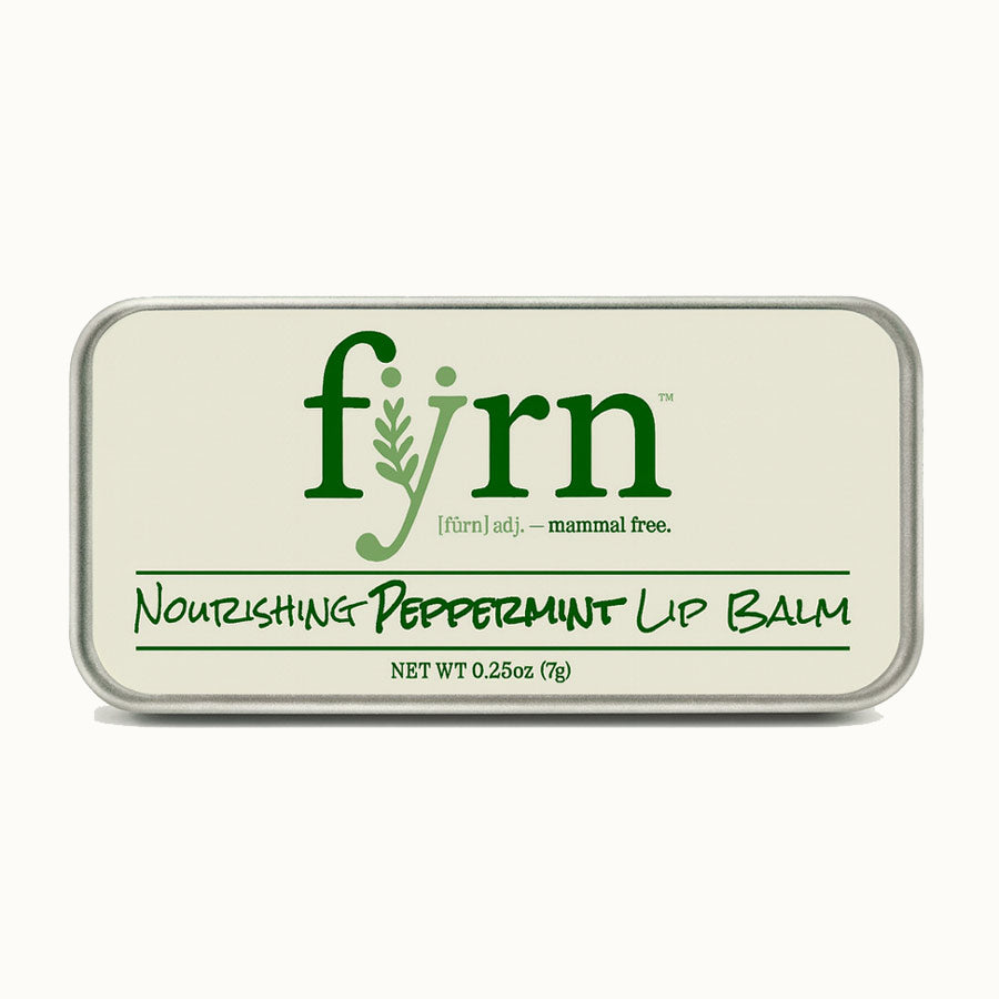 Fyrn nourishing peppermint lip balm packaging on a white background