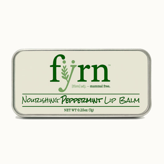 Fyrn nourishing peppermint lip balm packaging on a white background