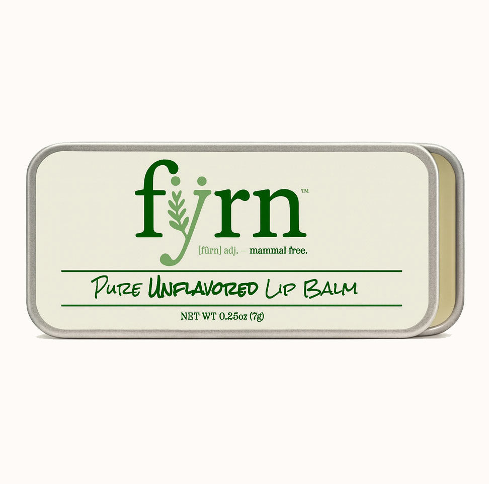 Fyrn pure unflavored lip balm container on a white background