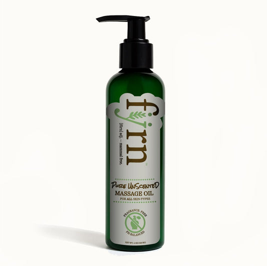 Green massage oil bottle with pump on a white background