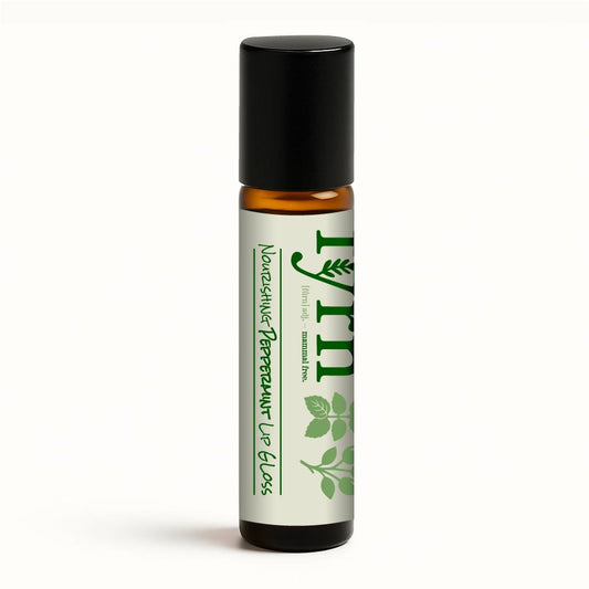 Roll-on bottle with a green label on a white background