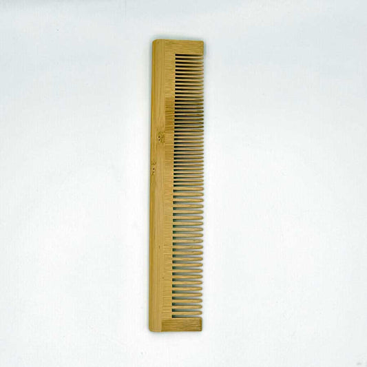 Wooden comb on a white background