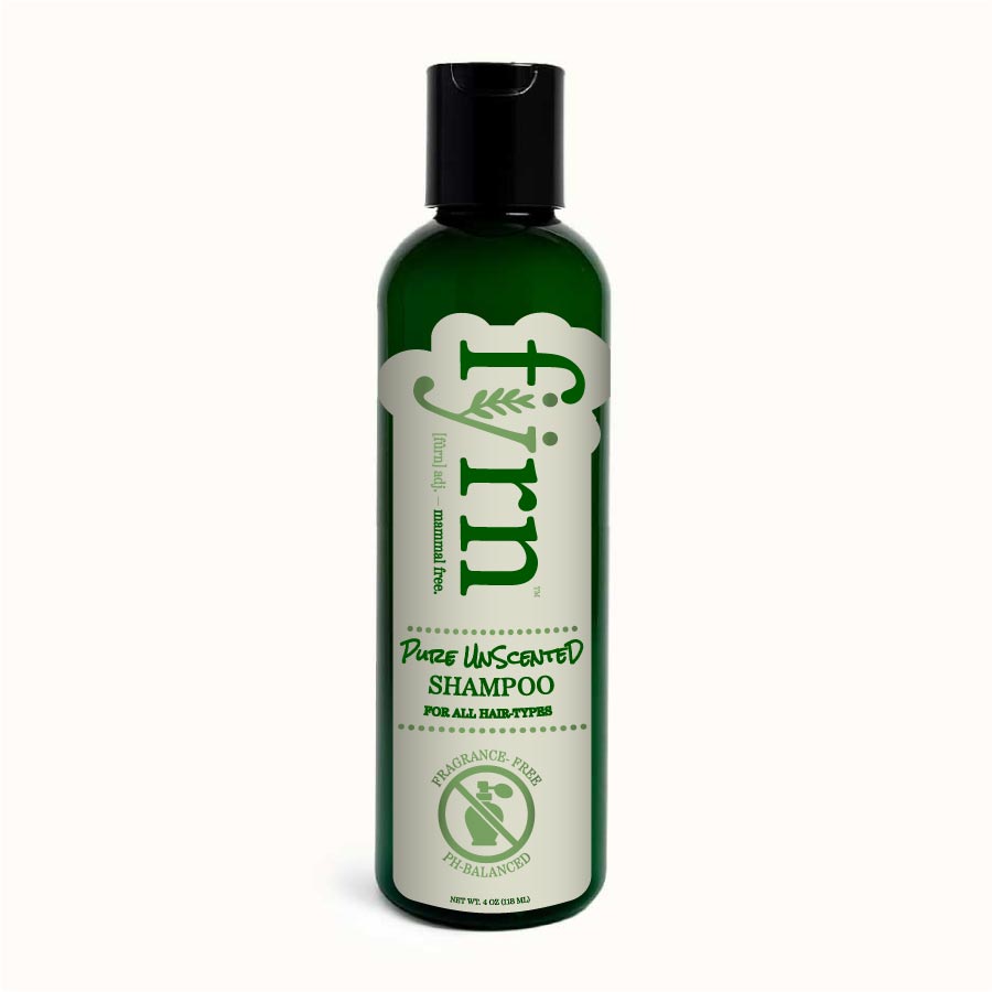 Green shampoo bottle with black cap on a white background